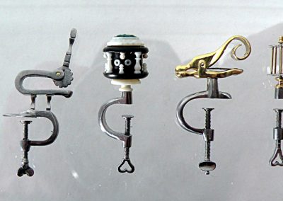 Miniature sewing clamps.