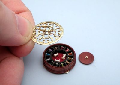 Miniature sewing kit.