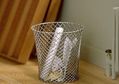 A tiny waste basket.