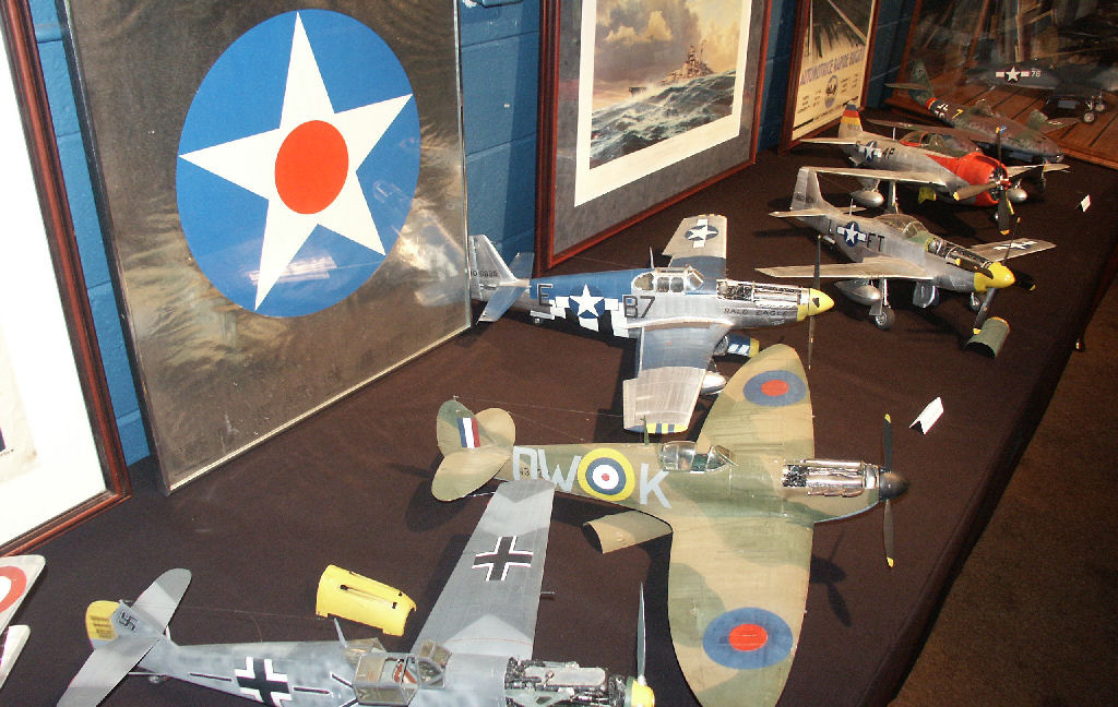 A collection of Guillermo’s 1/15 scale aircraft models on display.