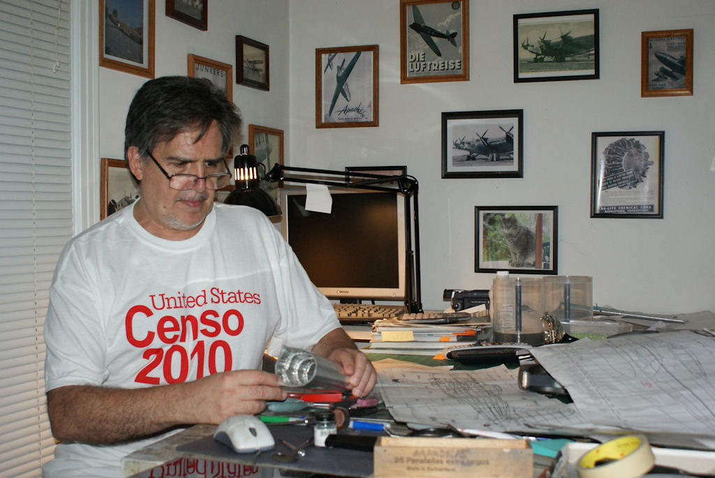 Guillermo at work in his model studio.