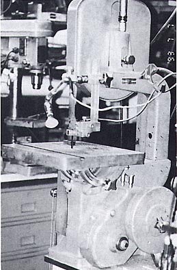 A bandsaw with gear reducer to cut both metal and wood. 