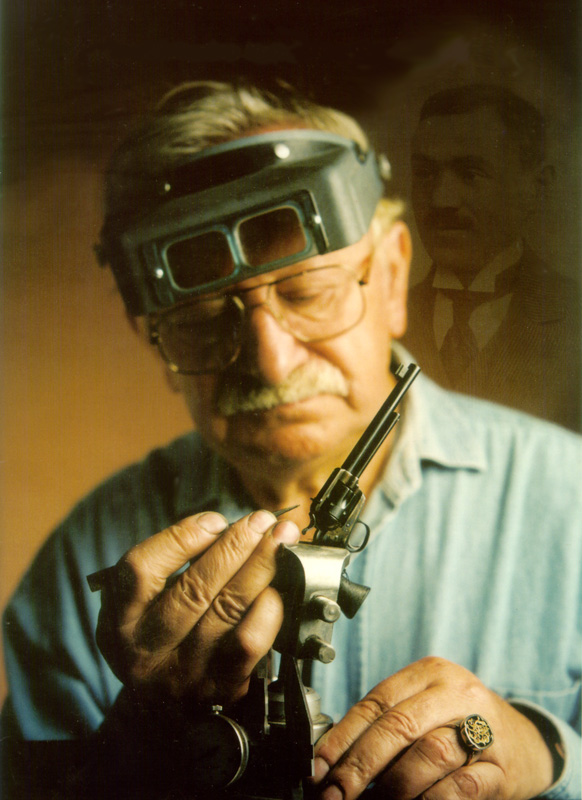 David Kucer at work making one of his miniature firearms. 