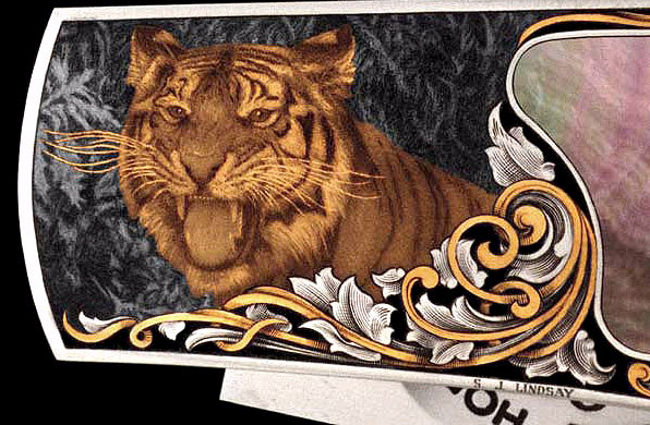 A tiger engraving and inlays made by Steve. 
