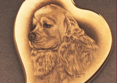 Steve engraved this cocker spaniel with inlaid diamonds.