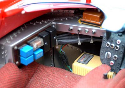 Electrical components are housed on the “passenger” side of the dash.
