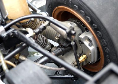 This close-up shows the brake calipers and brake lines.