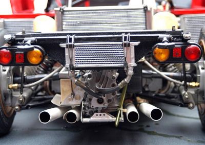 The transmission radiator and exhaust can be seen from the rear.
