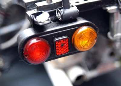 A close-up of the taillight group with reflector in the center.