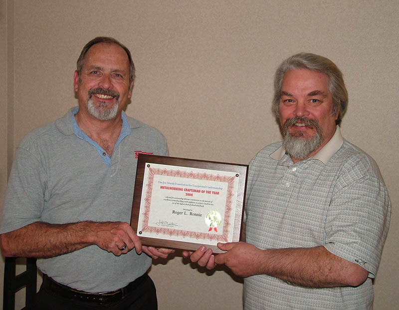 Roger Ronnie (right) accepts his Craftsman of the Year Award in 2004.