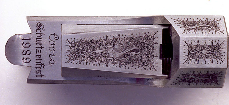 A top view of the Miller rifle engraving. 