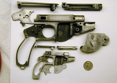 This photo shows the pistols further along and disassembled.