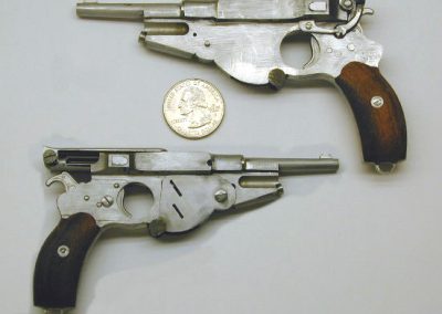 Both sides of the Bergmann pistol.