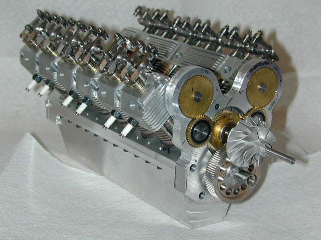 Roger's unfinished Merlin V-12 engine with gears exposed.