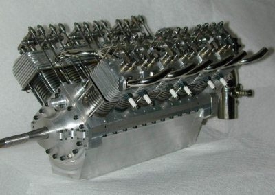 The engine with the intake and exhaust parts nickel plated.