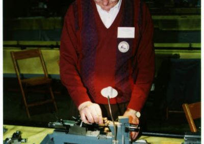 Bill Huxhold is seen here with his 1/6 scale Hardinge toolroom lathe.