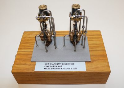 Miniature stationary boiler feed pumps circa 1885.