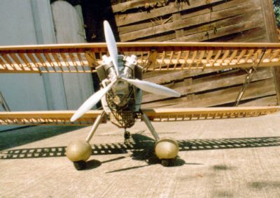A front view of the scale model biplane.
