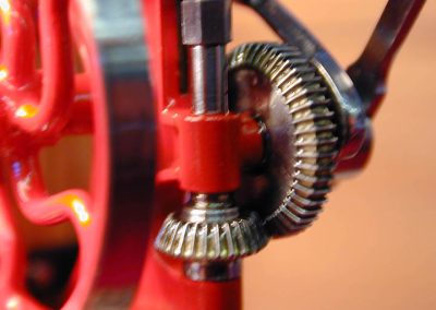 These tiny bevel gears drive the miniature post drill.