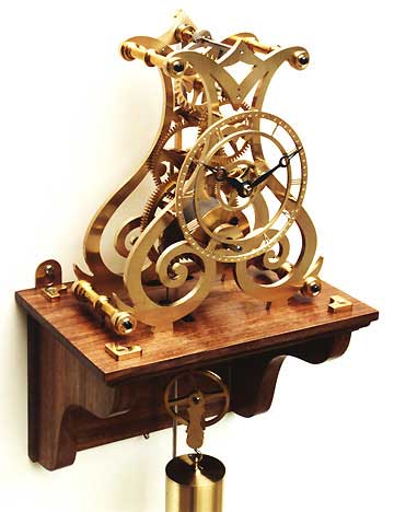 An intricate scroll skeleton wall clock made by William.