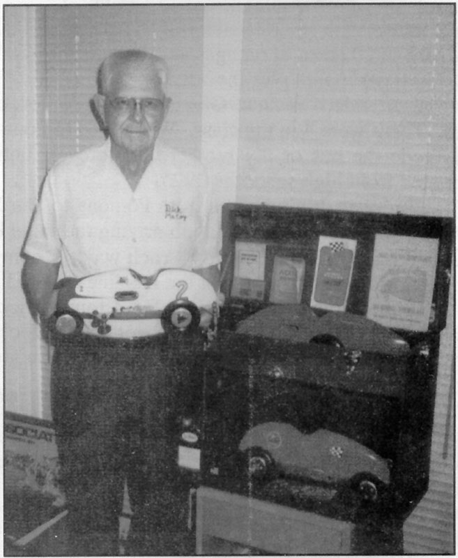 Dick holding an original 1948 Invader race car.