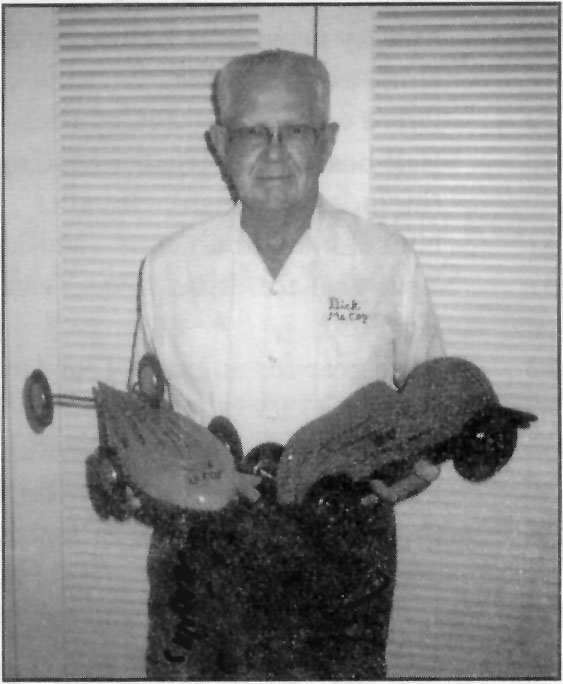 Dick with two of his original McCoy race cars.