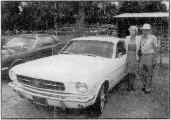 Dick and Fern McCoy with their Mustang.