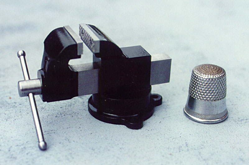 Al's 1/6 scale bench vise with a thimble for scale reference.