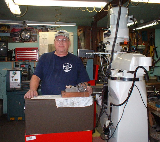 Clif in his shop with a Stuart engine project.