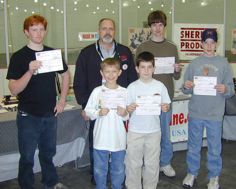 The five winners of the Young C. Park Youth Award stand with Craig Libuse. 