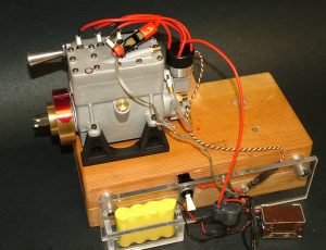 The Seal engine is seen in test mode, with one of the spark plugs grounded to test for spark.