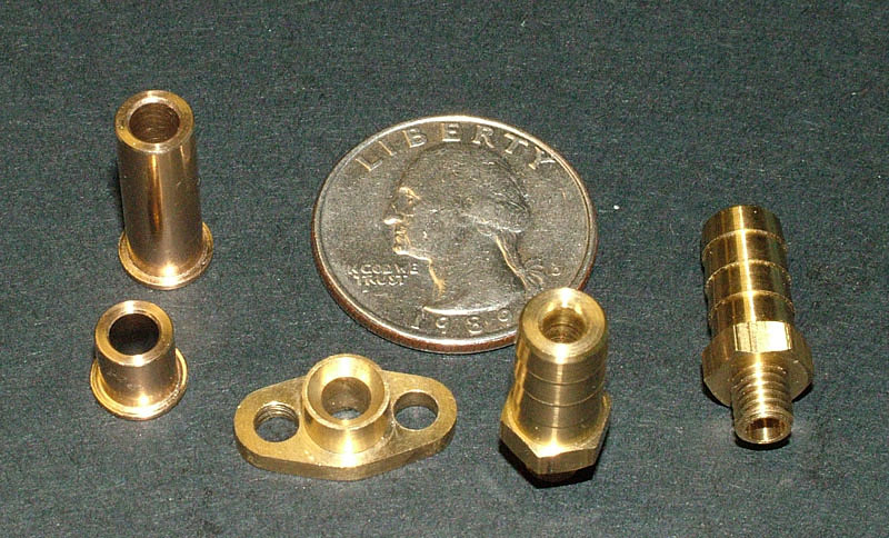 Steven’s brass flanges, bushings, and barbed water line fittings.