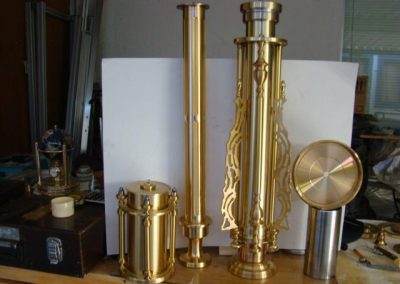 More components for the freestanding brass clock.