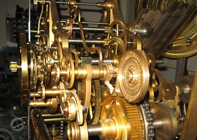 A closer look at the assembled gears of the brass clock.