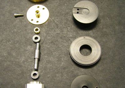 The disassembled component parts of the distributor and drive unit.