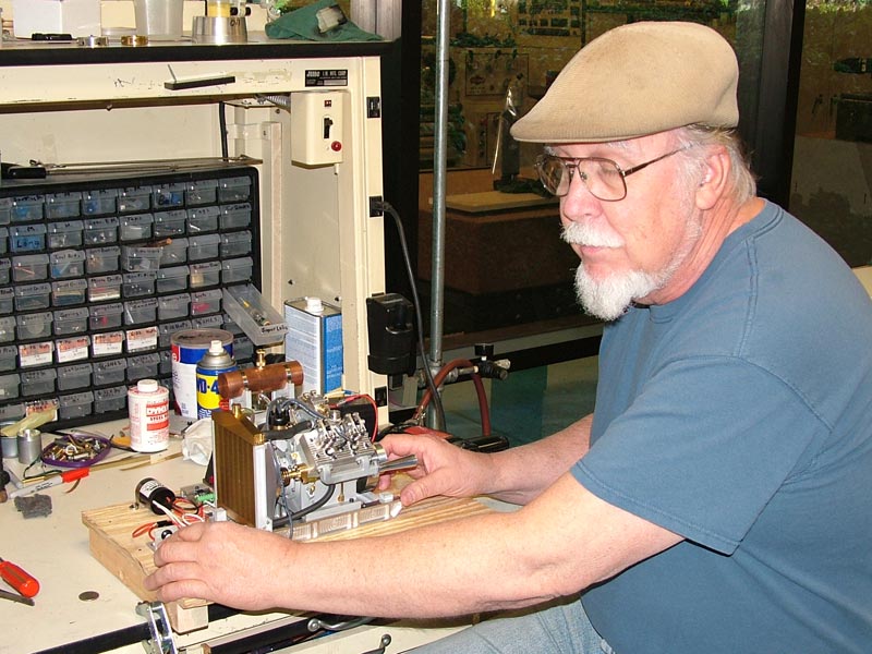 Tom Boyer fine tuning the Howell V-4 engine during its very first run. 