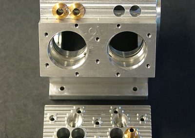 Bronze valve guides were machined for the block and head.