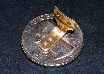 The distributor spark advance arm was milled from a solid piece of brass.