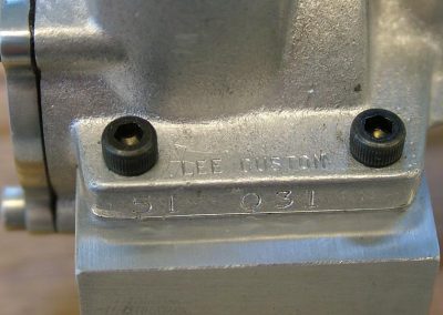 Clarence added his “Lee Custom” stamp to the frame above the serial number.