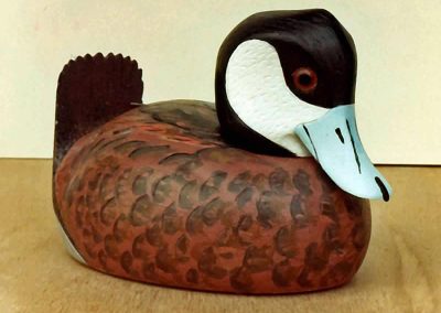 A Ruddy Duck miniature carved from pine.