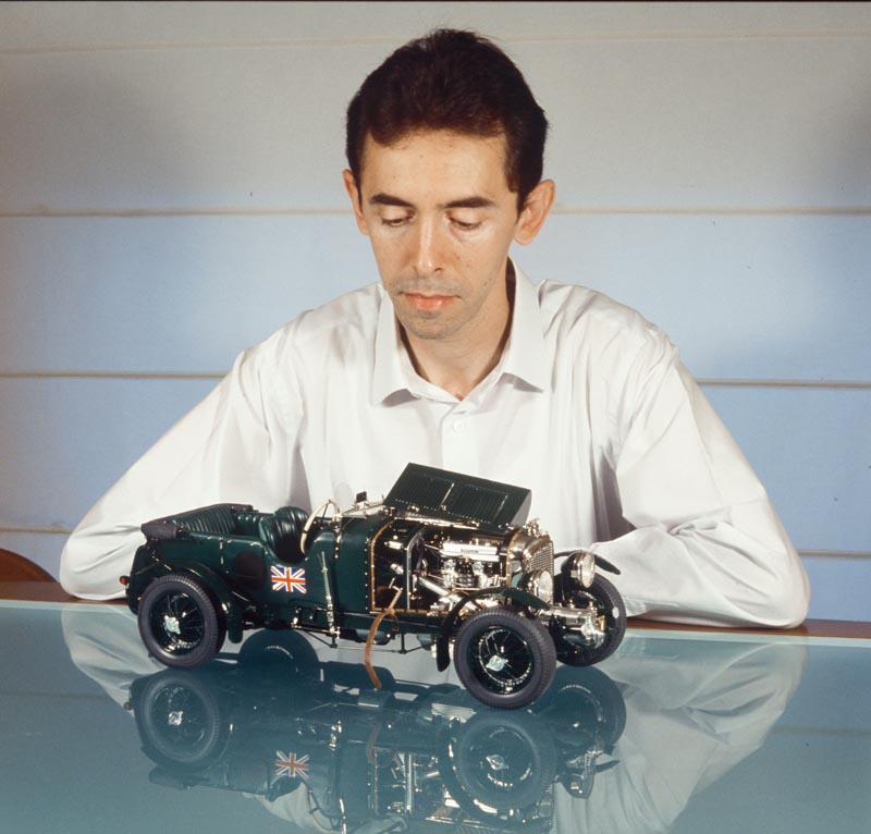 Francisco Pulido examines his 1/10 scale model of a 1930 4.5 liter Blower Bentley.