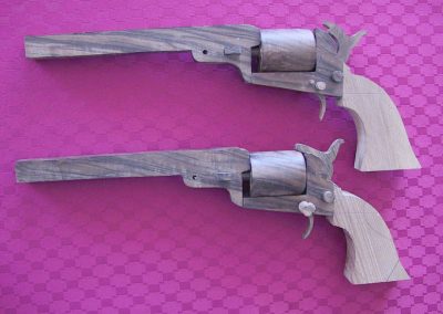 The unfinished Colt Navy revolvers.