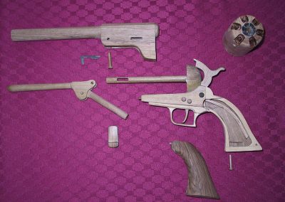 The disassembled Colt Walker revolver.