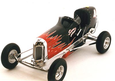 This scale dirt car sports some classic flames.