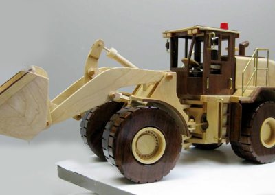 Sunia’s Caterpillar loader is made of maple and black walnut.