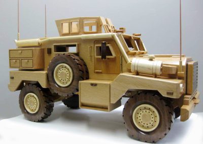 A model MRAP Cougar made of European Beech, maple, and black walnut.
