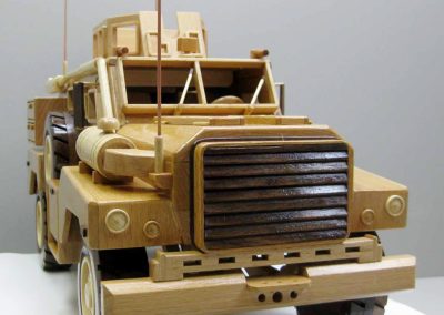 A model MRAP Cougar made of European Beech, maple, and black walnut.