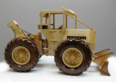 This model log skidder was made from European Beech, maple, and black walnut.