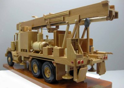 A water well drilling rig model.