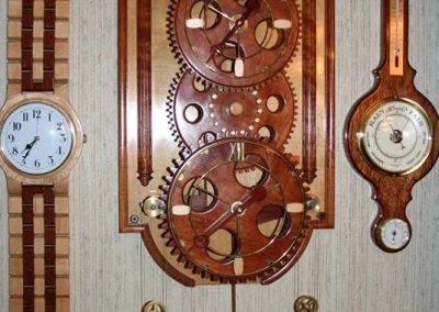 This open-gear wall clock was made entirely from wood.